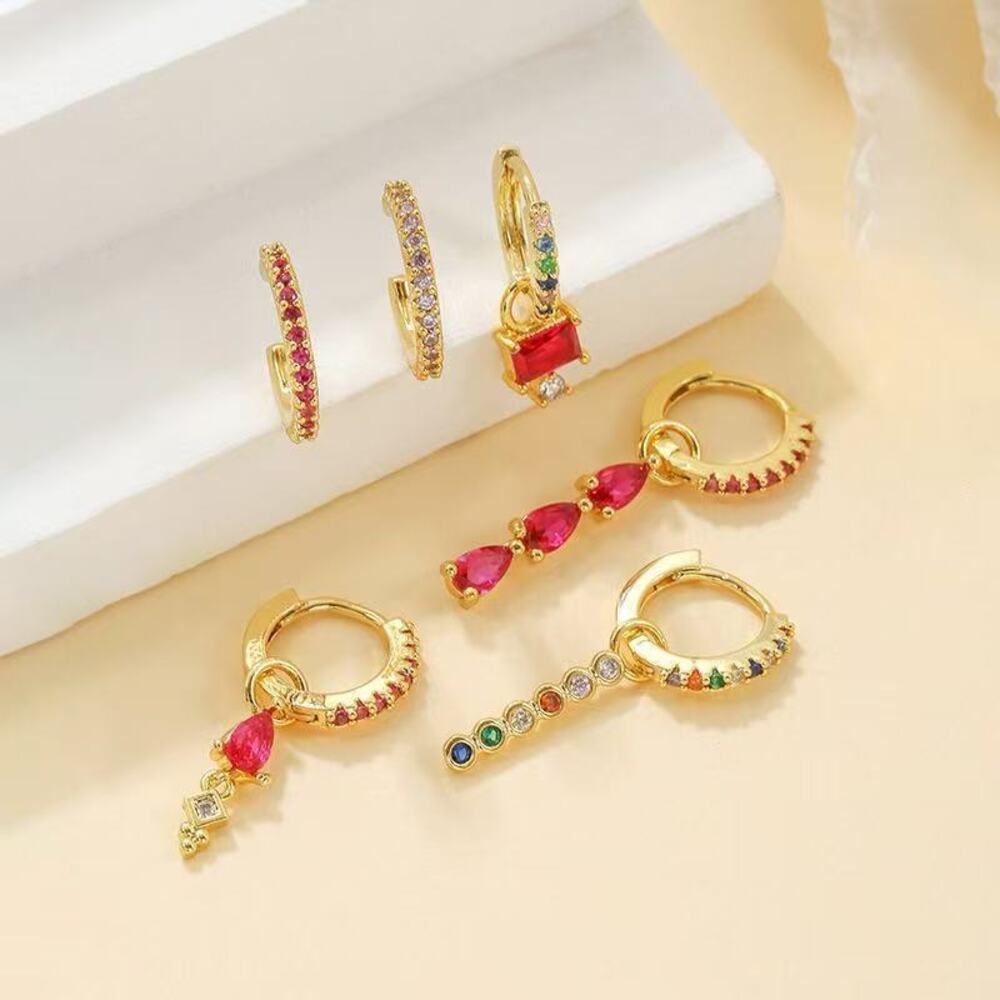 Open U-arch earrings with a hollow petal motif. - Picture 1 of 4